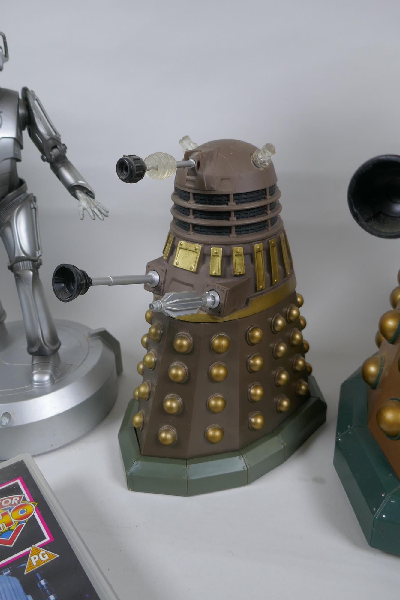 A quantity of Dr Who collectors' items, to include toy Daleks and Cybermen, moneybox, Earthshock VHS - Image 4 of 8