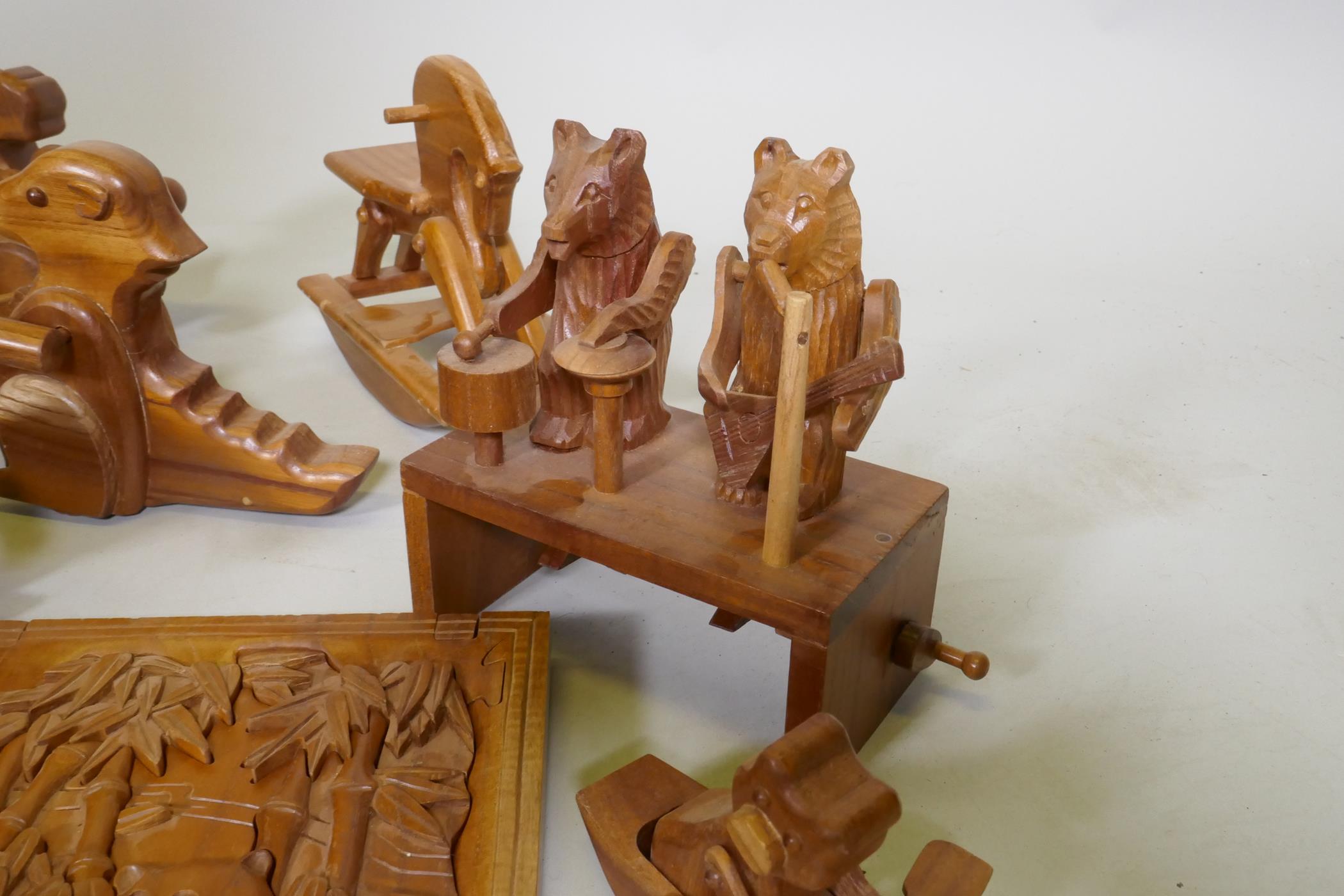 A collection of wood puzzles and toys, aeroplane, 26cm long - Image 4 of 6