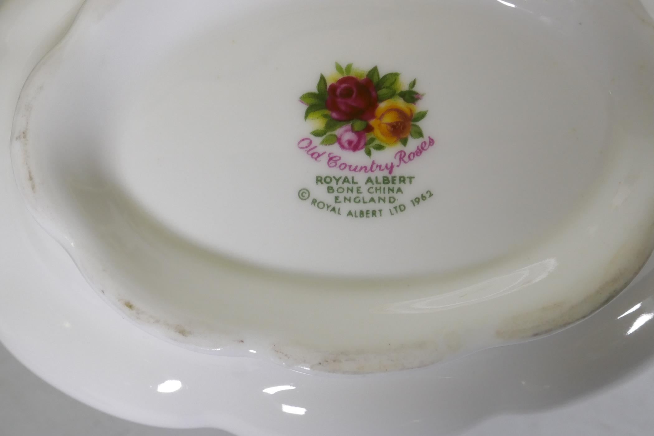 A Royal Albert Country Rose six place dinner service, with serving plates, tureens etc, appears - Image 7 of 7