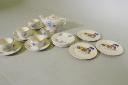 A vintage child's tea set and three Noddy plates