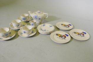 A vintage child's tea set and three Noddy plates