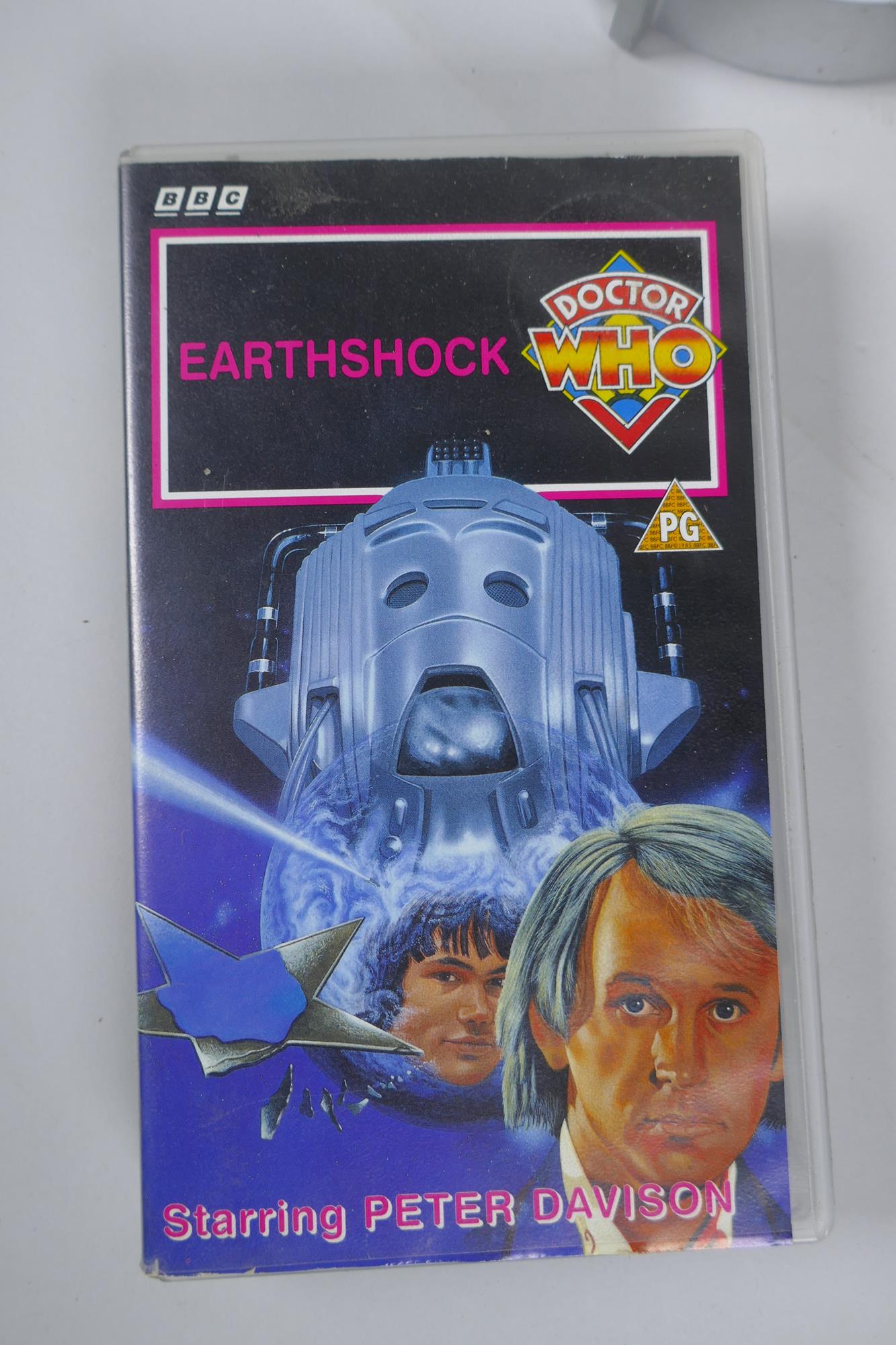 A quantity of Dr Who collectors' items, to include toy Daleks and Cybermen, moneybox, Earthshock VHS - Image 7 of 8