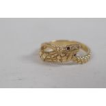 A 9ct gold snake ring set with ruby eyes, 3g