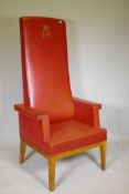 A vintage magistrate's high back oak throne chair with red leather covers and ER II cypher, 165cm