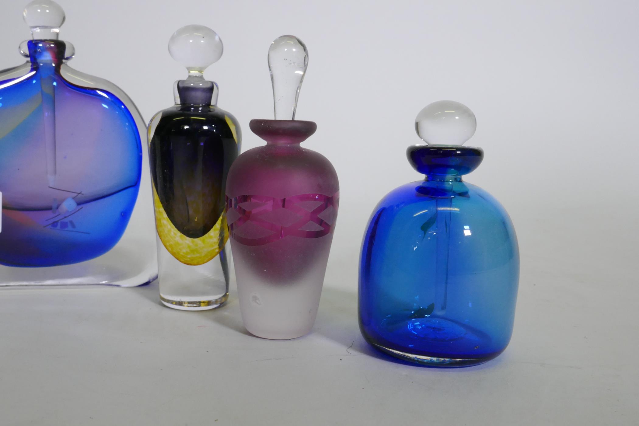 A collection of scent bottles, David Wallace, urn shaped bottle, squat blue bottle, Keith Bowlby (no - Image 2 of 5