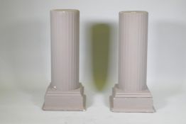 A pair of vintage papier mache and plaster fluted column plinths, 92cm high, 27cm diameter top