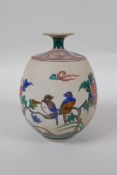 A Japanese unglazed ceramic vase with famille vert enamel bird and flower decoration, mark to