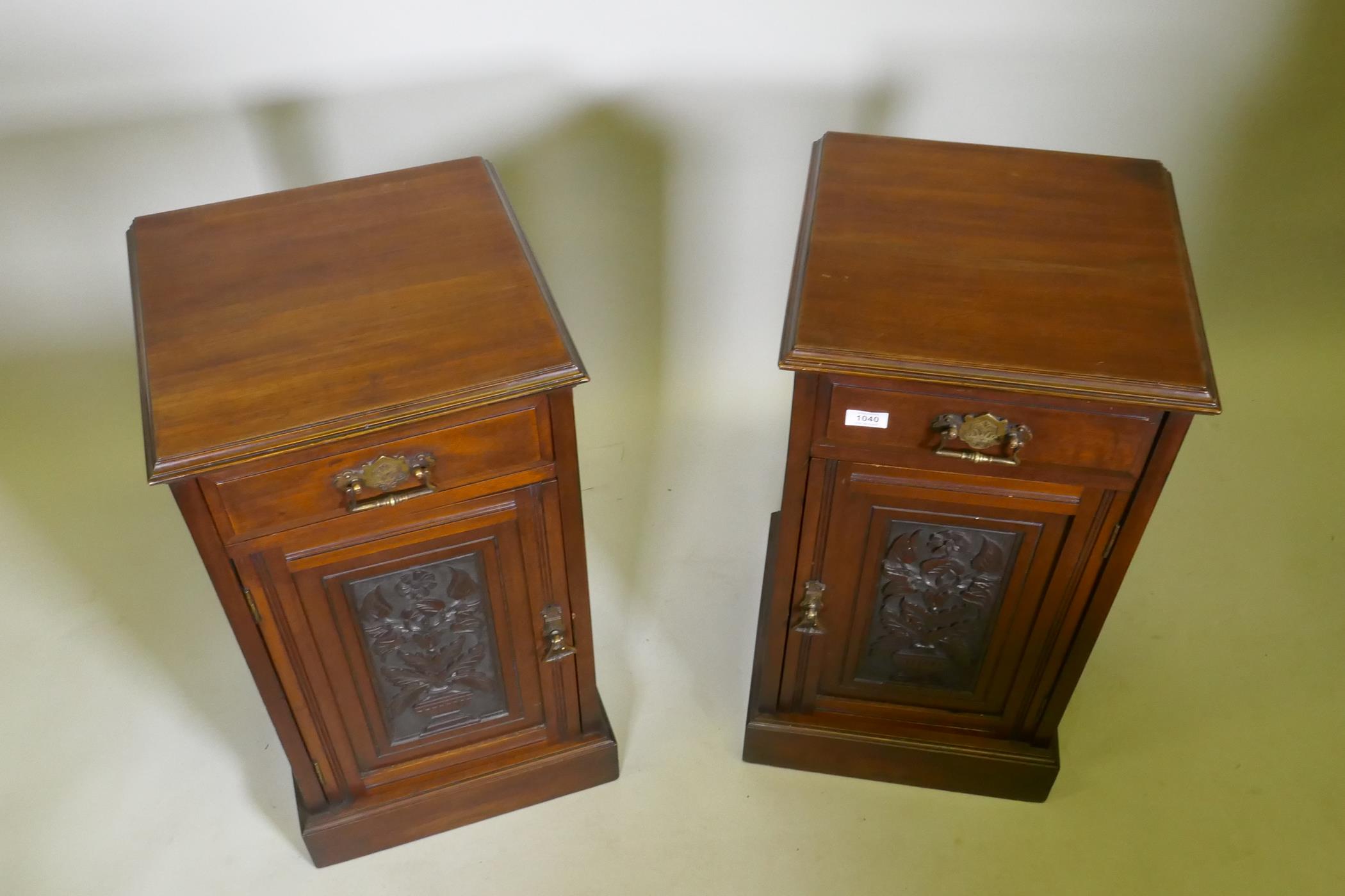 A pair of Victorian walnut bedside cabinets with single drawer over carved cupboard door, raised - Image 3 of 4