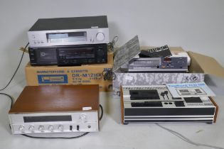 A Fisher FM-2331 Stereo tuner; Denon stereo cassette deck, DR-M12HX; Tandberg TCD 310, cassette
