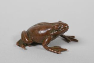 A Japanese style bronze okimono frog, indistinct mark to belly, 4cm long