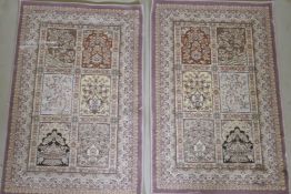 A pair of fine woven bamboo silk rugs with traditional Persian panel designs on a lilac coloured