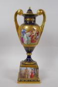 A Vienna porcelain urn and cover, with gilt highlights and hand painted decoration depicting the