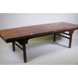 An antique Chinese elm altar table, 201 x 69cm, 57cm high