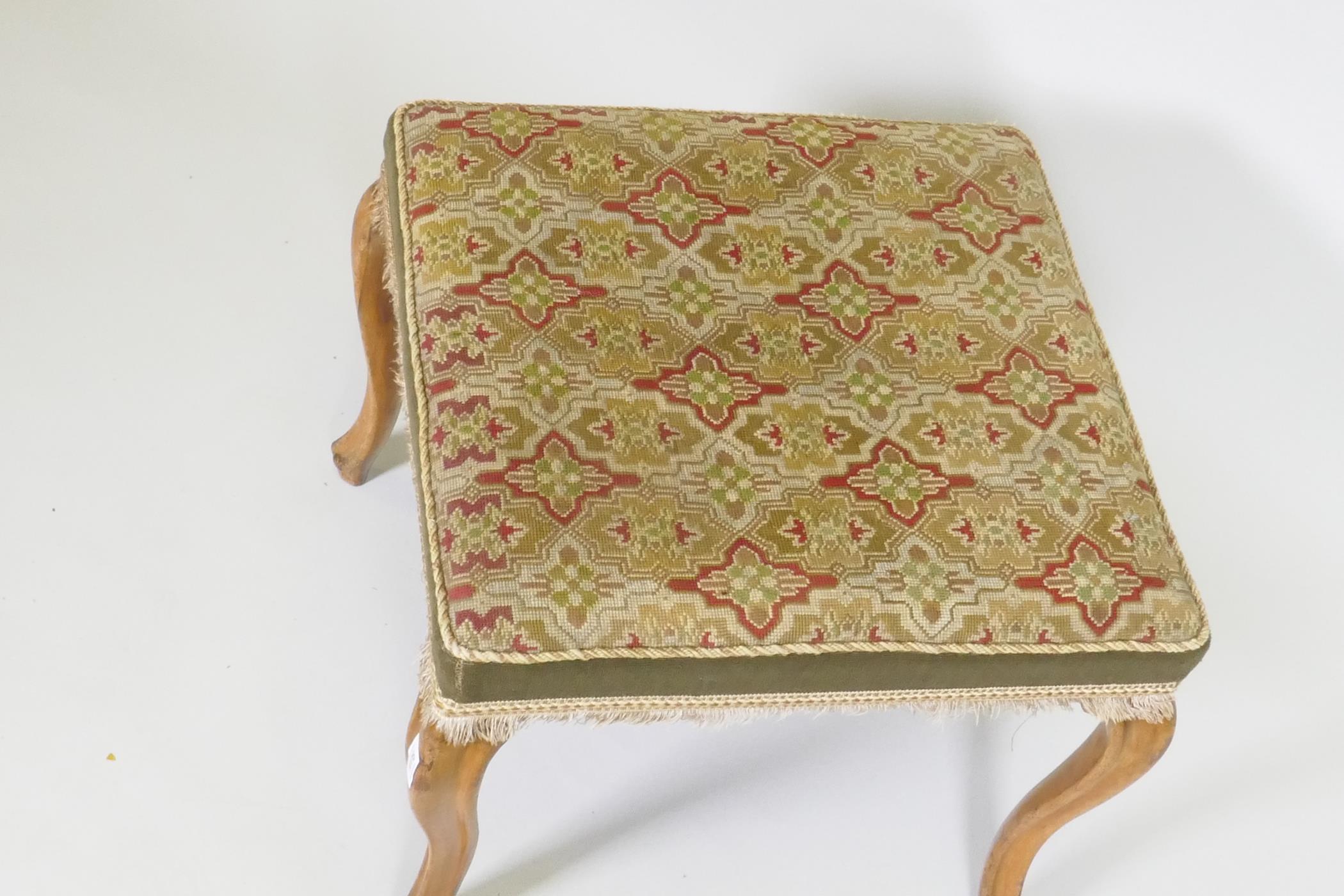 A Victorian walnut stool with tapestry cover, raised on cabriole supports, 53 x 53 x 46cm - Image 2 of 4