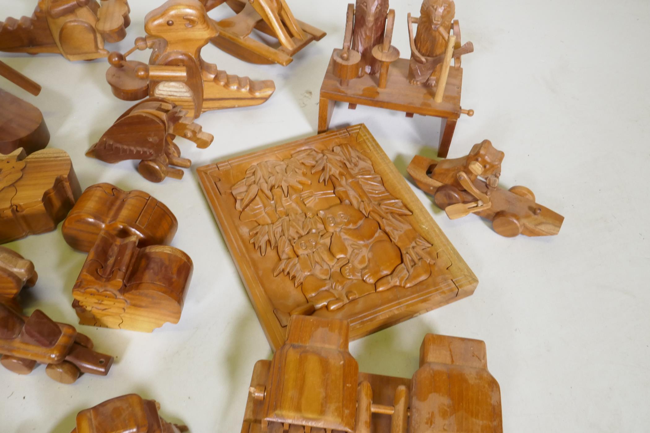 A collection of wood puzzles and toys, aeroplane, 26cm long - Image 3 of 6
