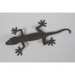 A filled bronze figure of a Gecko, 28cm long