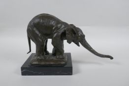 After Rembrandt Bugatti (Italian, 1884-1916), bronze figure of a begging elephant, 29cm long x