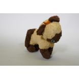 A Merrythought plush brown point Siamese cat, 15cm high