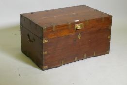 A C19th campaign teak chest, with brass mounts and carrying handles, the interior fitted with a lift