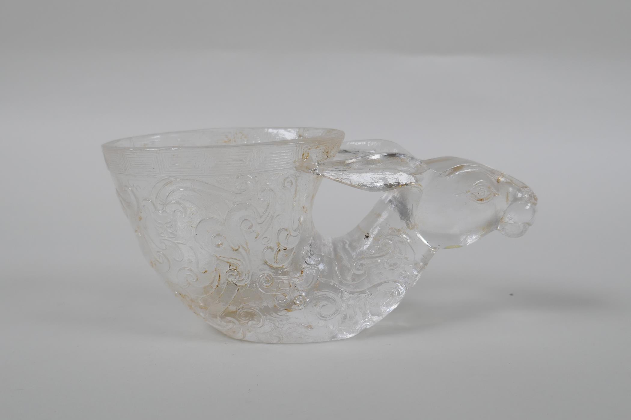 A Chinese moulded glass libation cup in the form of a deer's head, 15cm long