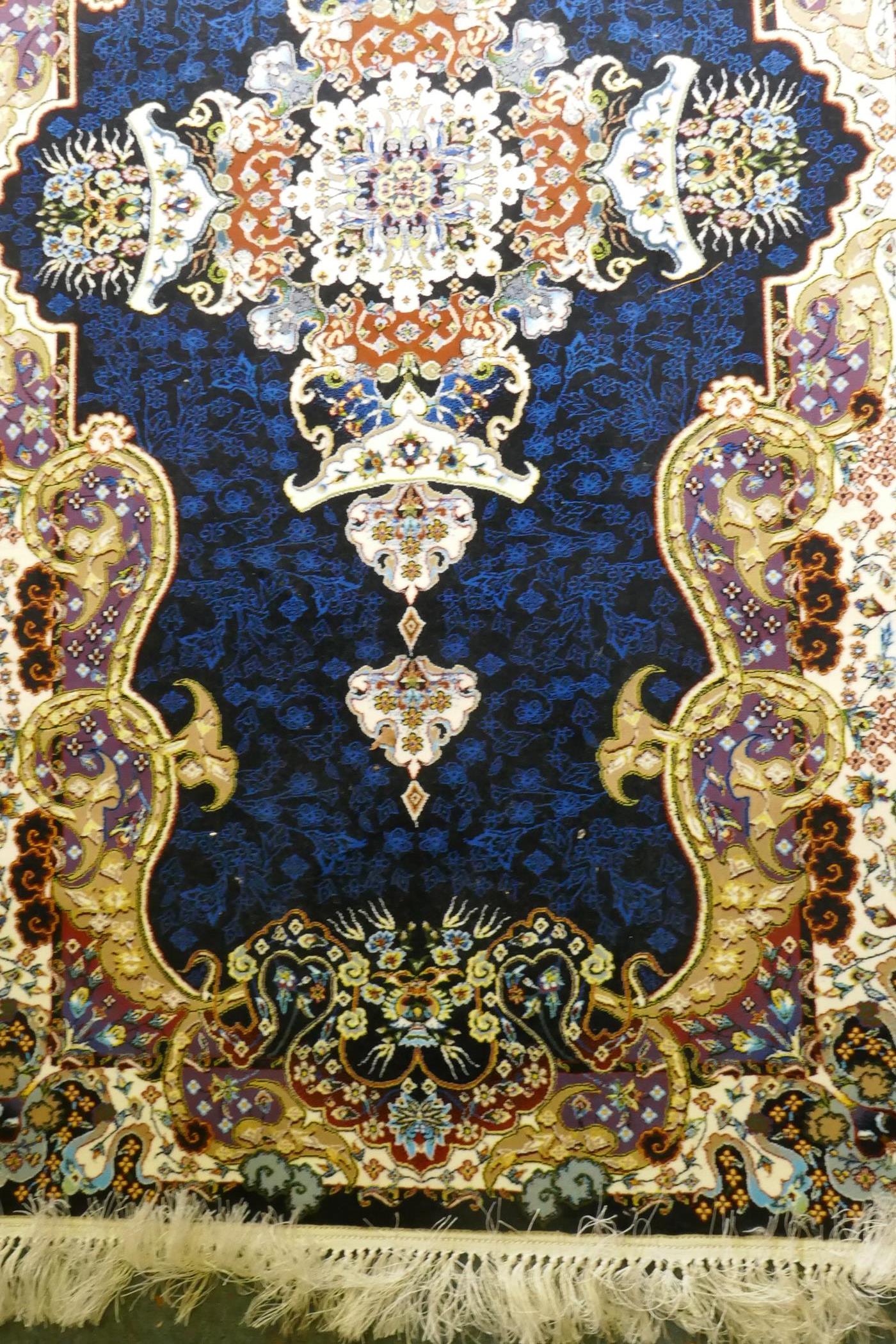 An Iranian fine woven runner with floral medallion design on a deep blue field, 100x  410cm - Image 4 of 8
