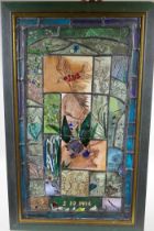 A stained glass artwork panel decorated with birds, monogrammed PM, 42 x 68cm