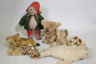 A vintage Paddington Bear, a plush elephant, seal, tiger, leopard, real fur Koala bear in a pair