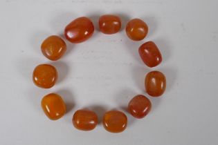 A quantity of loose butterscotch amber beads, 51g