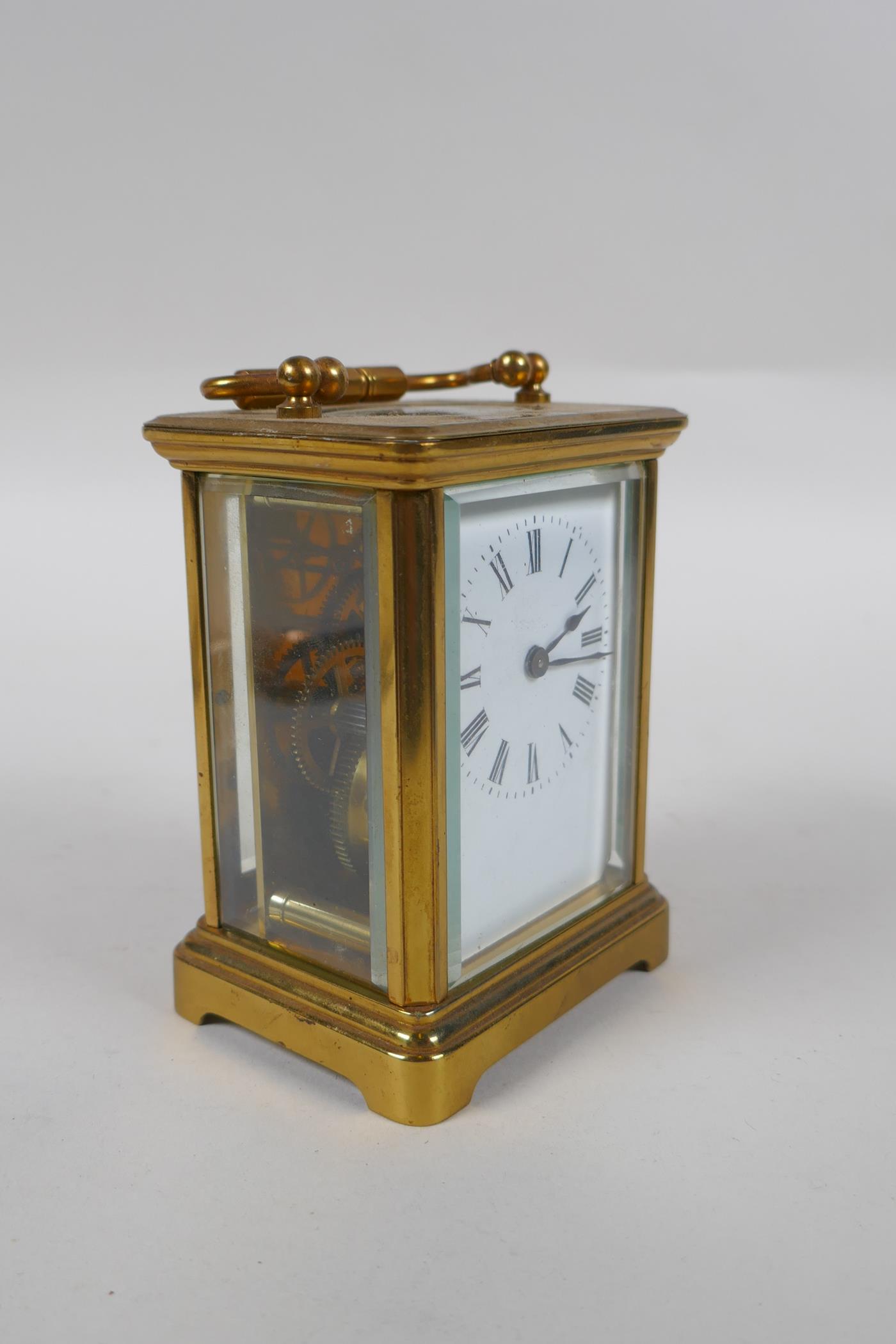 A brass cased carriage clock, the enamel dial with Roman numerals, 8 x 6cm, 11cm high - Image 2 of 4