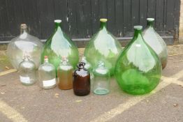 A quantity of vintner's glass carboys and demi-johns