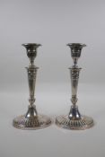 A pair of Victorian hallmarked silver candlesticks by Alfred Thomas Slater, Walter Brindley Slater