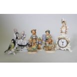 Continental porcelain figures, five Goebel (one AF), a figure group, Karl End bird and a clock