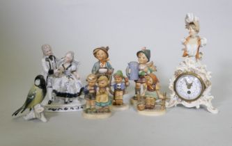 Continental porcelain figures, five Goebel (one AF), a figure group, Karl End bird and a clock