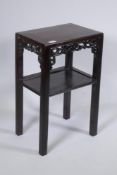 An antique Chinese hardwood two tier side table with carved and pierced frieze, 41 x 30cm, 67cm high