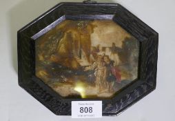 An antique painting on ceramic tile, depicting Tobias and the Angel, in an ebonised wood frame,