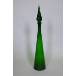 An Italian green glass bottle and stopper, 70cm high