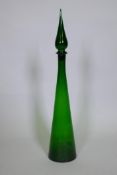 An Italian green glass bottle and stopper, 70cm high