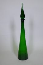 An Italian green glass bottle and stopper, 70cm high