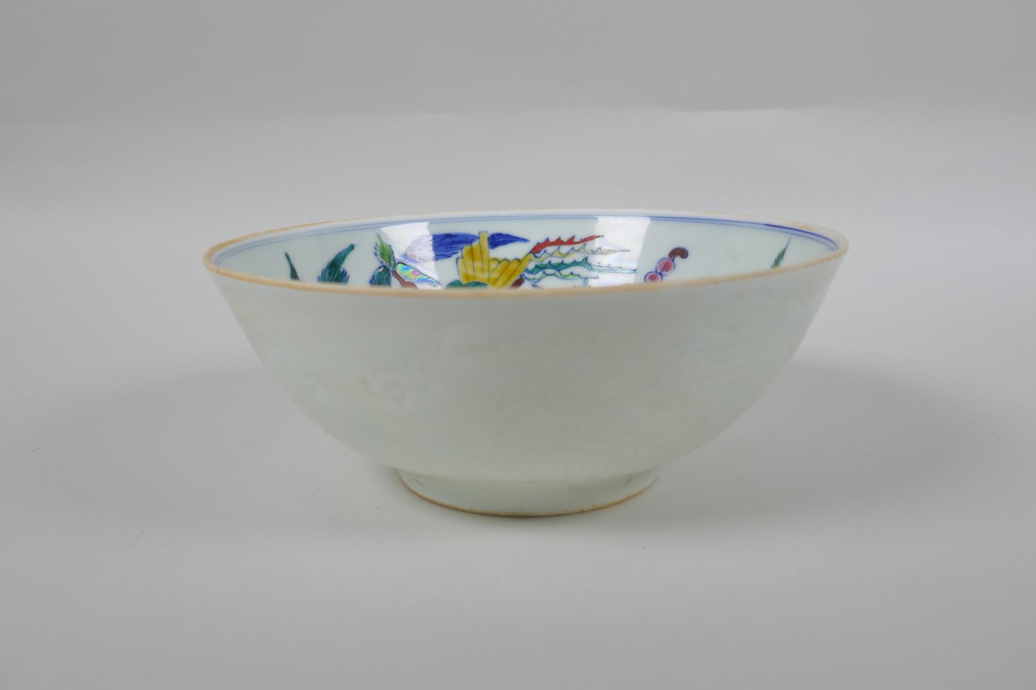 A Chinese porcelain bowl with wucai enamel bird decoration to the interior and incised dragon - Image 2 of 6