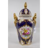 An antique continental porcelain jar and cover with gilt highlights and hand painted floral