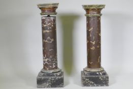 A pair of C19th painted pine column pedestals, with faux marble decoration, 97cm high, top 26 x 26cm