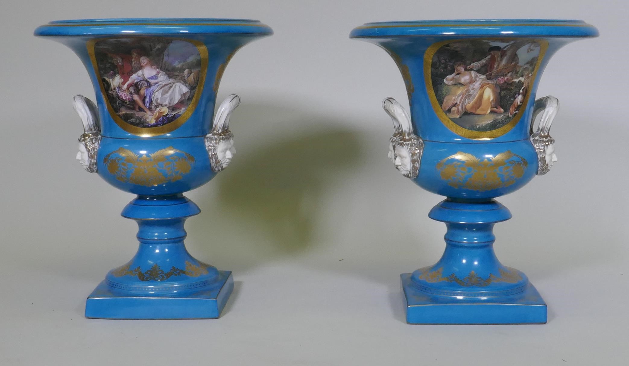 A pair of Sevres style continental porcelain vase decorated with courting couples, on a blue ground,