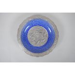 A Chinese blue glazed porcelain bowl with silvered lobe rim and centre, with under glaze dragon,