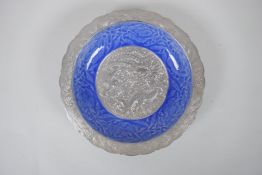 A Chinese blue glazed porcelain bowl with silvered lobe rim and centre, with under glaze dragon,