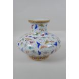 A Chinese polychrome porcelain vase of squat form with all over butterfly decoration, GuangXu 6