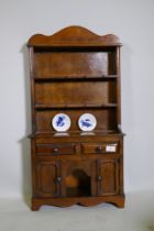 A mid century miniature model of an oak dresser, 40 x 12 x 76cm