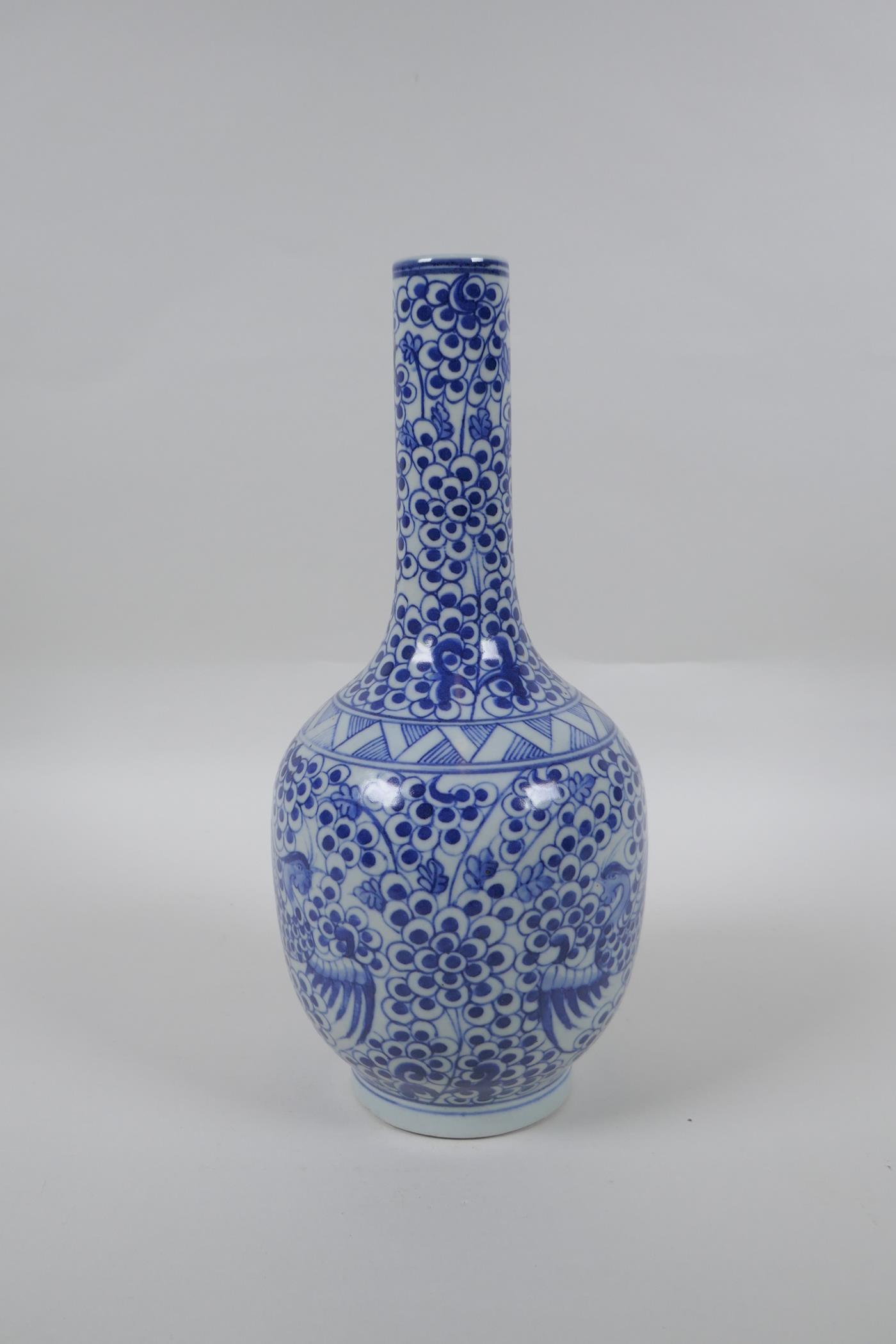 A Chinese blue and white porcelain bottle vase with phoenix decoration, mark to base, 29cm high - Image 2 of 5