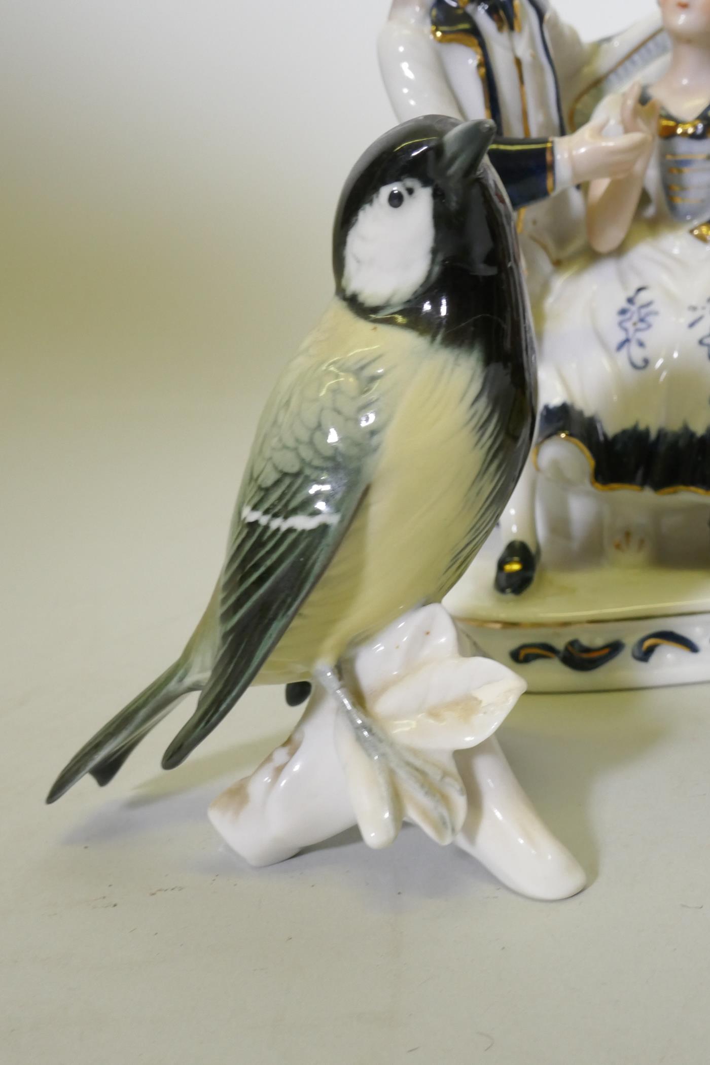 Continental porcelain figures, five Goebel (one AF), a figure group, Karl End bird and a clock - Image 7 of 9