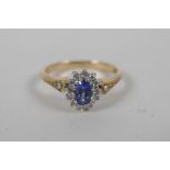 A 9ct gold, sapphire and diamond cluster ring, approx 0.1ct, approx size K