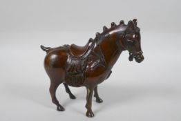 A Chinese bronze figure of a Tang style horse, 14cm high